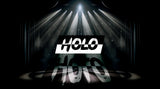 Dark stage with spotlights highlighting the brand logo HOLO
