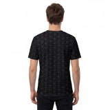 Back view of a men’s all-over printed t-shirt. Features the same mirrored design as the front.