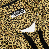 Close-up of Leopard Code print fabric product with a visible HOLO brand label and black drawstring details.